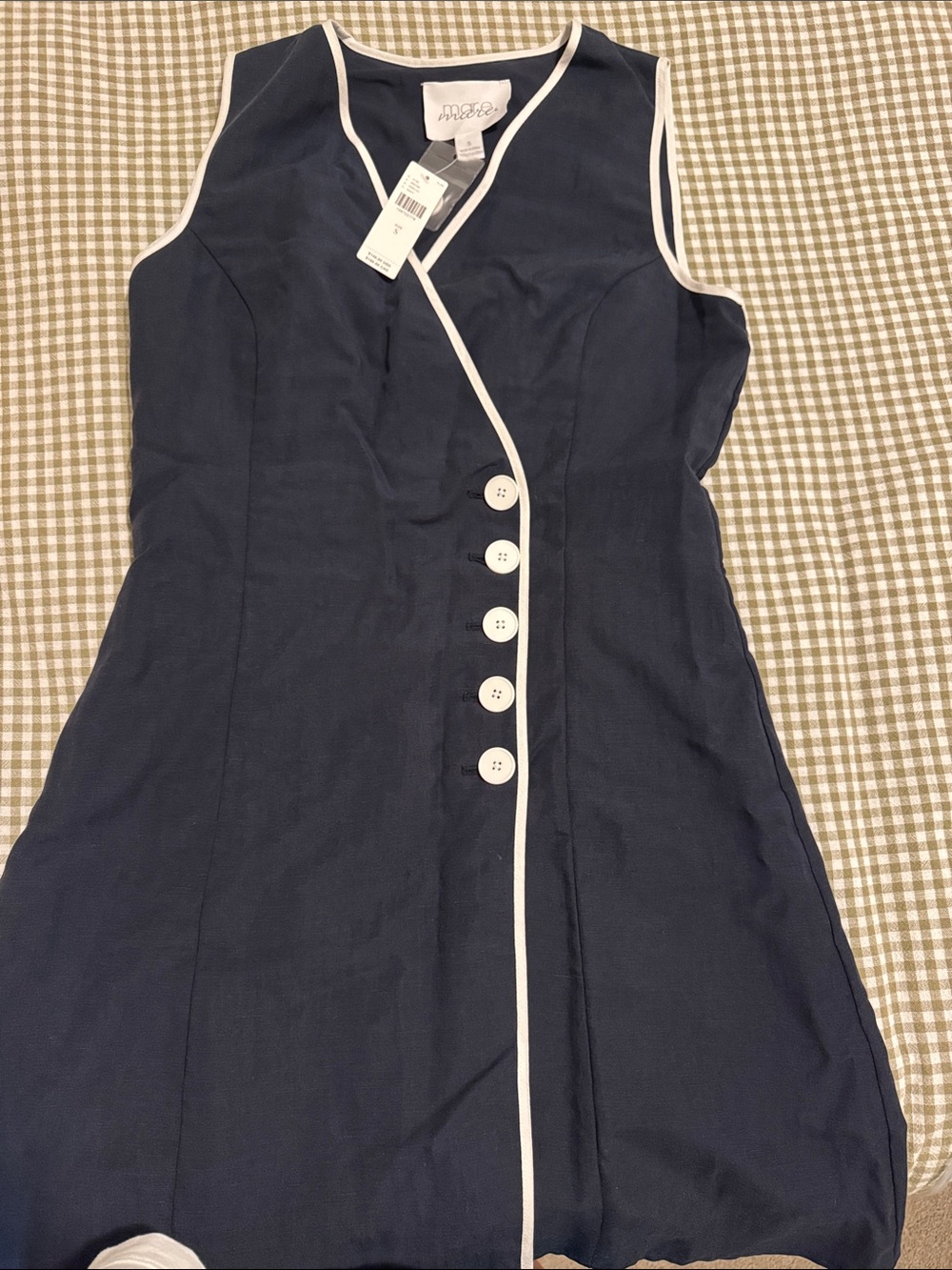 Sleeveless Navy Mini Dress with White Trim and Button Front